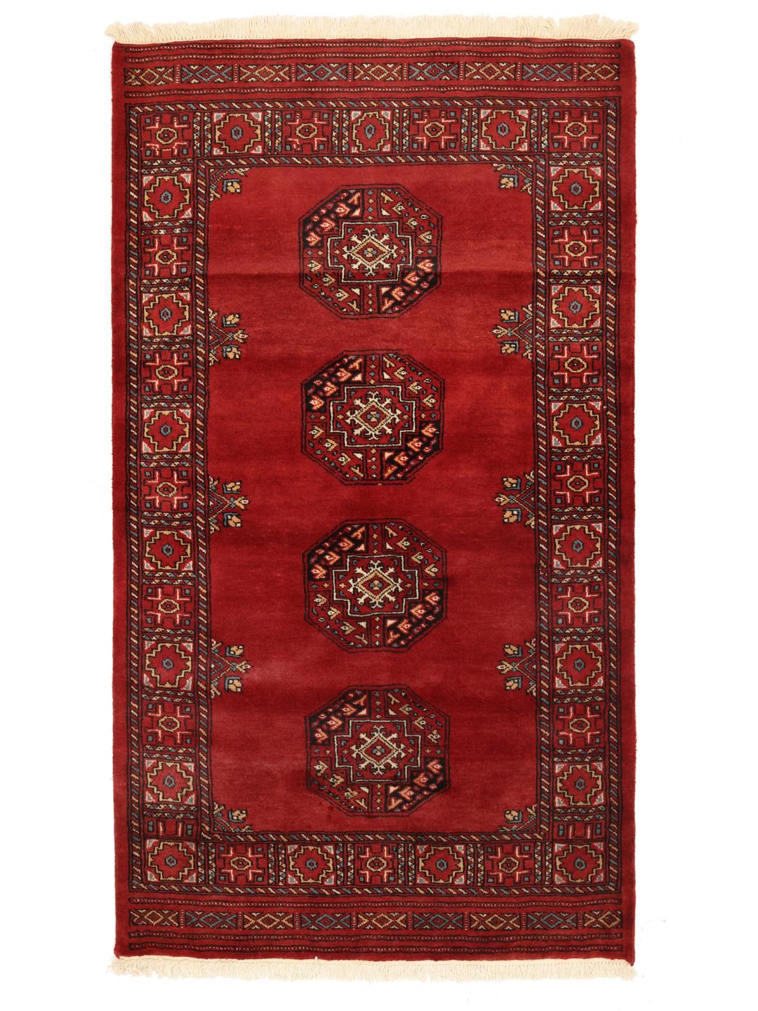 Handmade wool rug from Pakistan in red