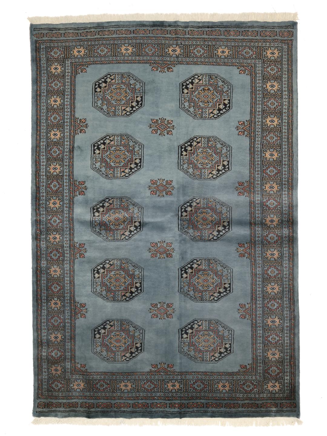 Tapis noue a la main du Pakistan en bleu