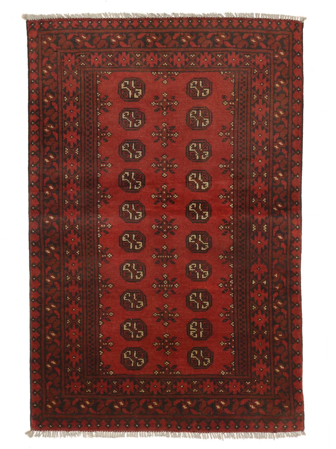 Handmade red Afghan rug with traditional motifs