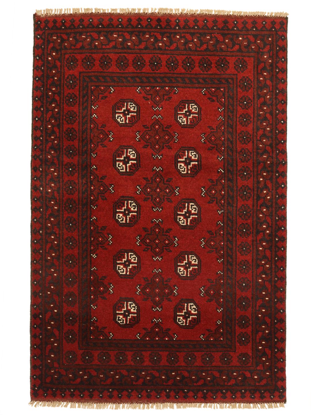 Hand-knotted Afghan Fine wool rug in red with tribal patterns